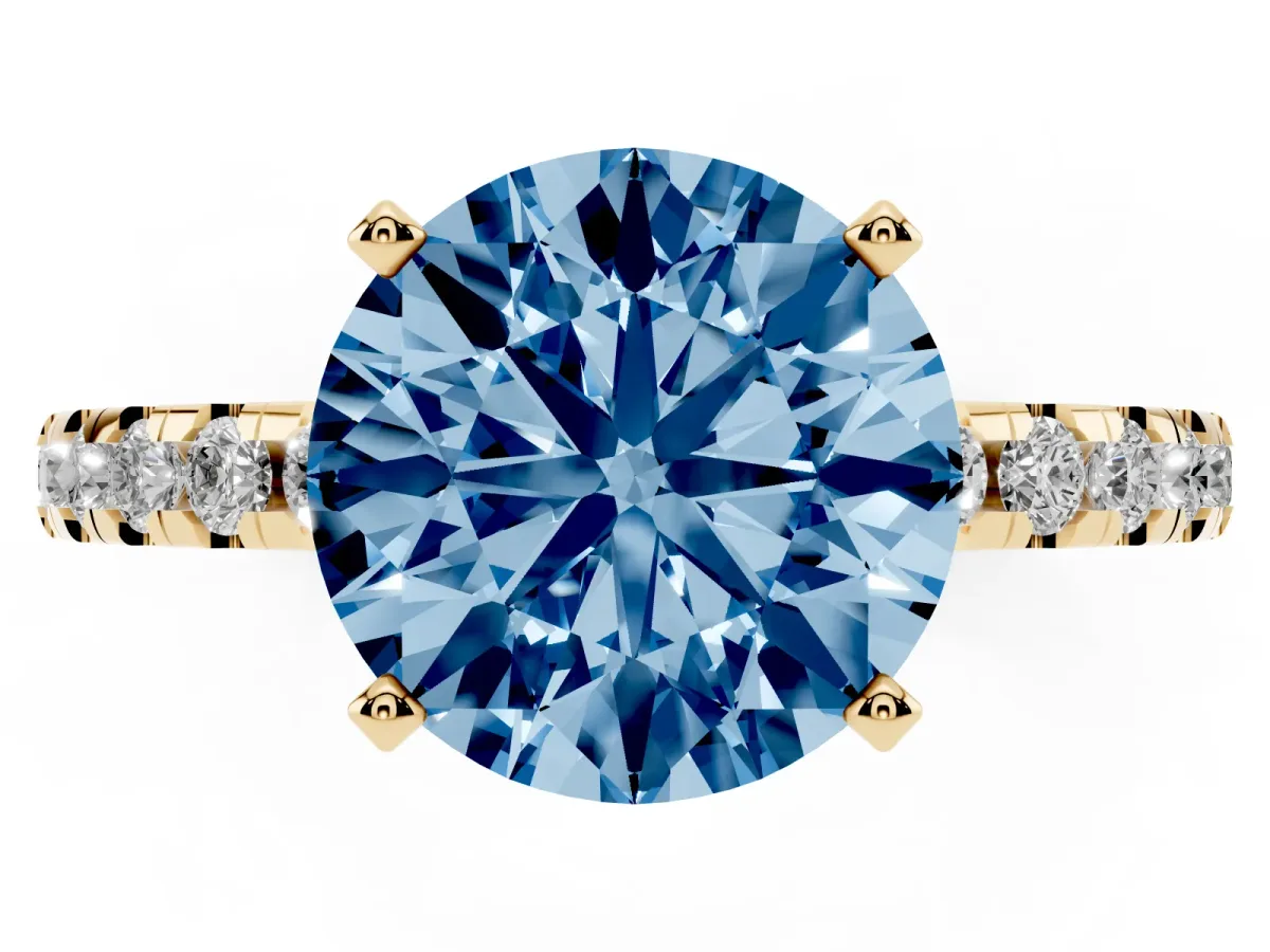 Fancy Blue Round Cut Diamond Solitaire Ring with Round Pavé Band and Four-Prong Setting Yellow gold