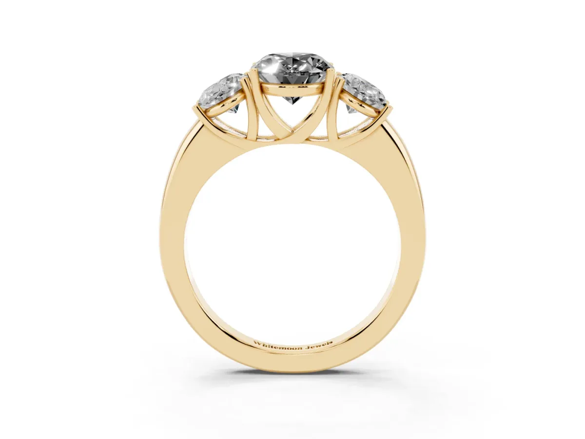 Fancy Black Oval Cut Diamond Three-Stone Ring with Four-Prong Setting and Classic Band Yellow gold