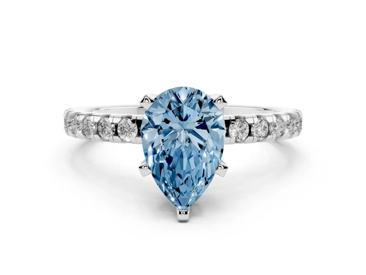 Fancy Blue Pear Cut Diamond Solitaire Ring with Round Pavé Band and Four-Prong Setting Silver