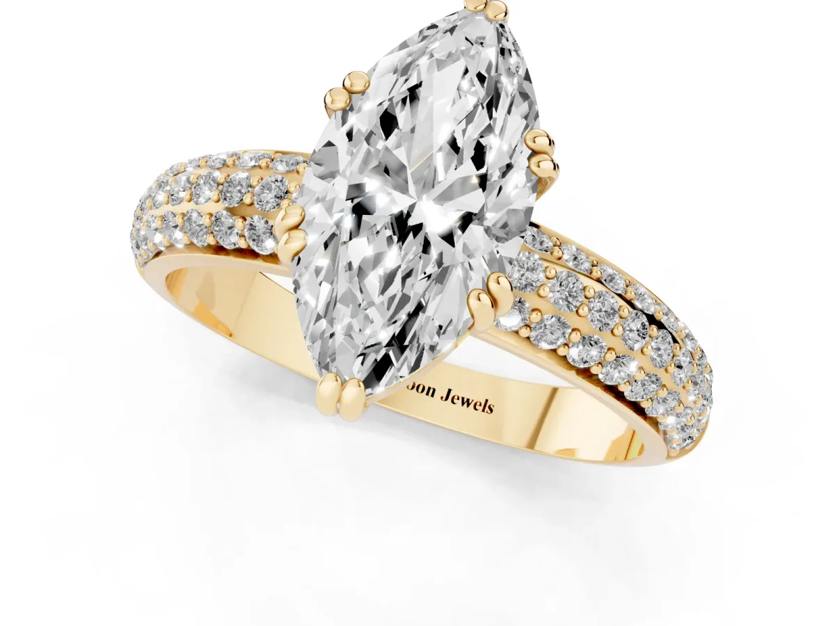 Marquise Cut Diamond Solitaire Ring with Multi-Row Round Pavé Band and Prong Setting Yellow gold