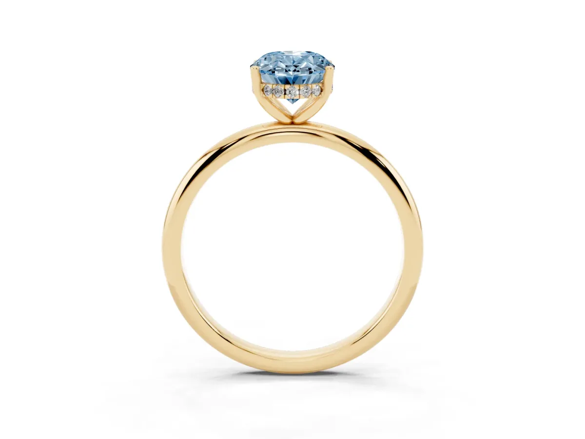 Fancy Blue Oval Cut Cut Solitaire Engagement Ring with Four-Prong Setting and Classic Band Yellow gold