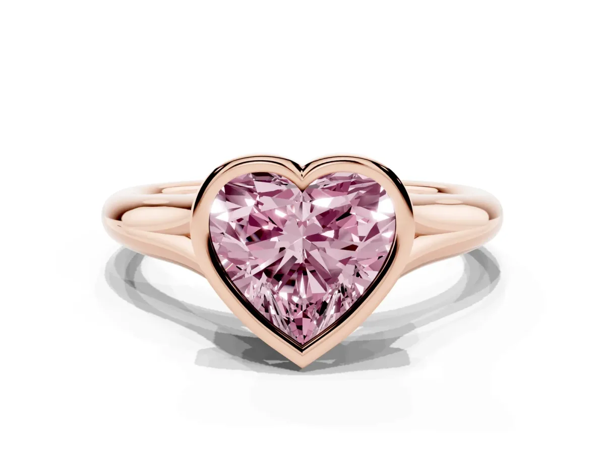 Fancy Pink Bezel Set Heart Cut Solitaire Diamond Ring with Smooth Band Rose gold