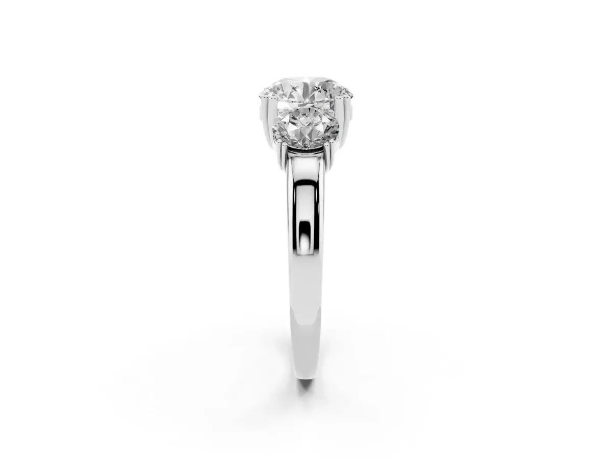 Three-Stone Round Cut Cut Diamond Ring with Channel Set Band and Four-Prong Setting Silver