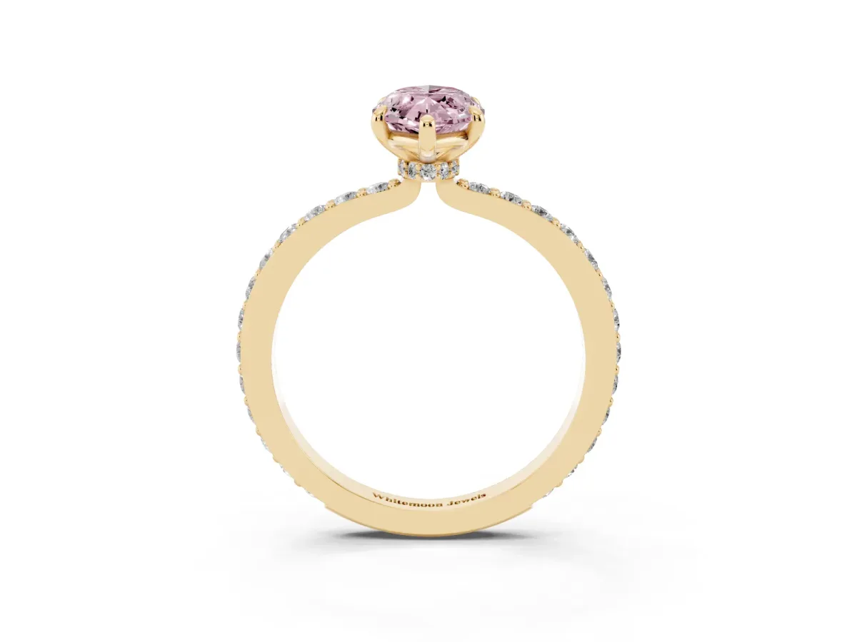 Fancy Pink Marquise Cut Diamond Pavé Engagement Ring with Round Accents and Prong Setting Yellow gold