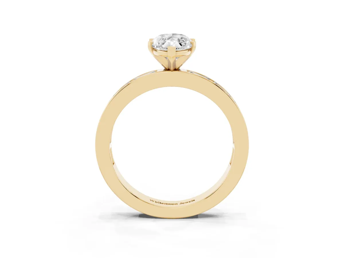 Marquise Cut Solitaire Diamond Ring with Channel-Set Baguette Band and Four-Prong Setting Yellow gold