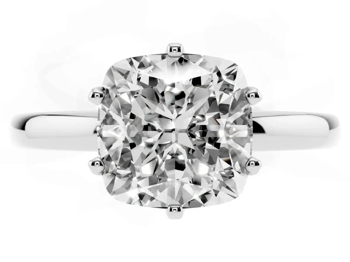 Cushion Cut Solitaire Diamond Ring with Six-Prong Setting on a Classic Band Platinum