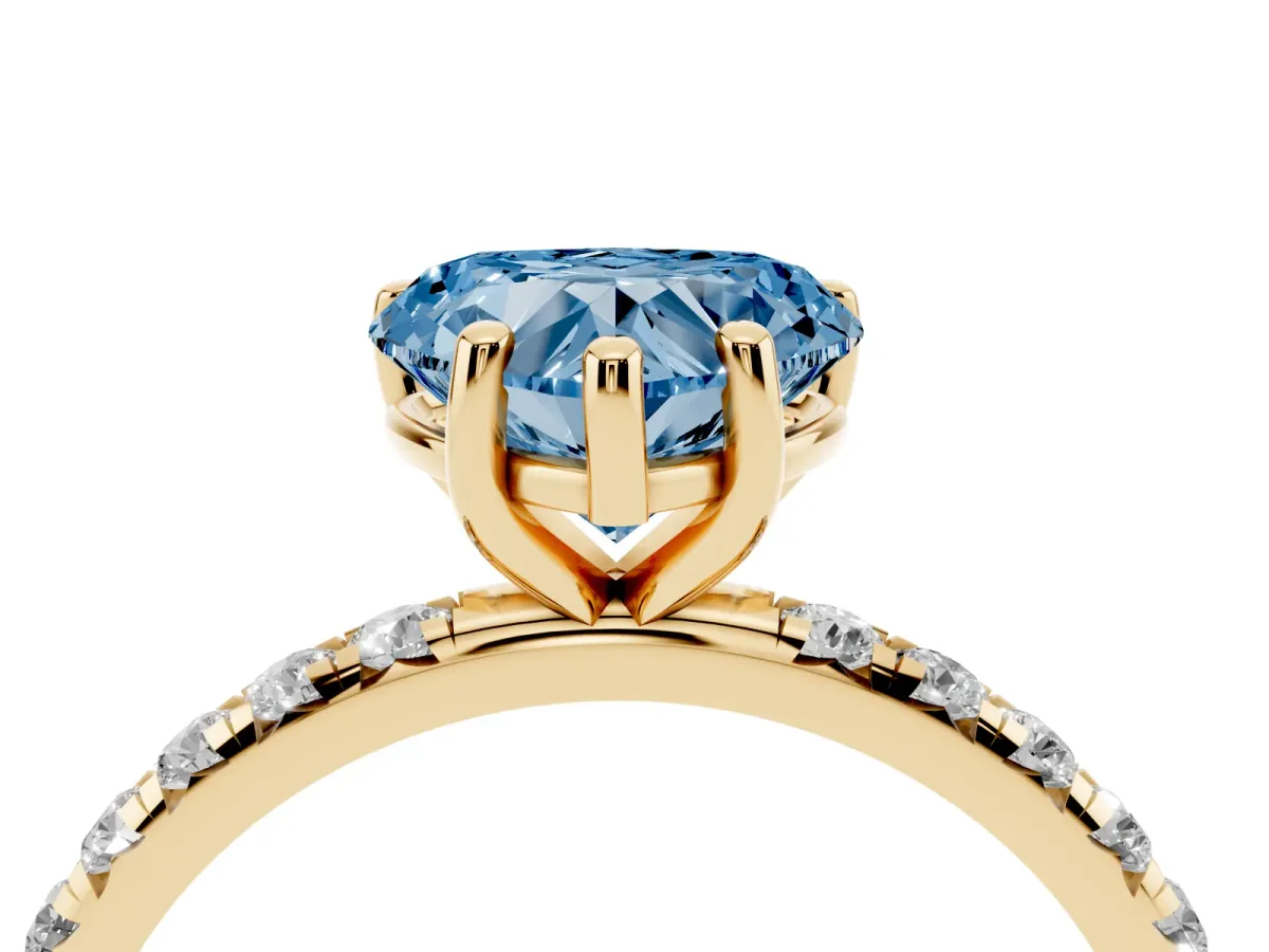 Fancy Blue Heart Cut Cut Diamond Solitaire Ring with Micro Pave Band and Four Prong Setting Yellow gold