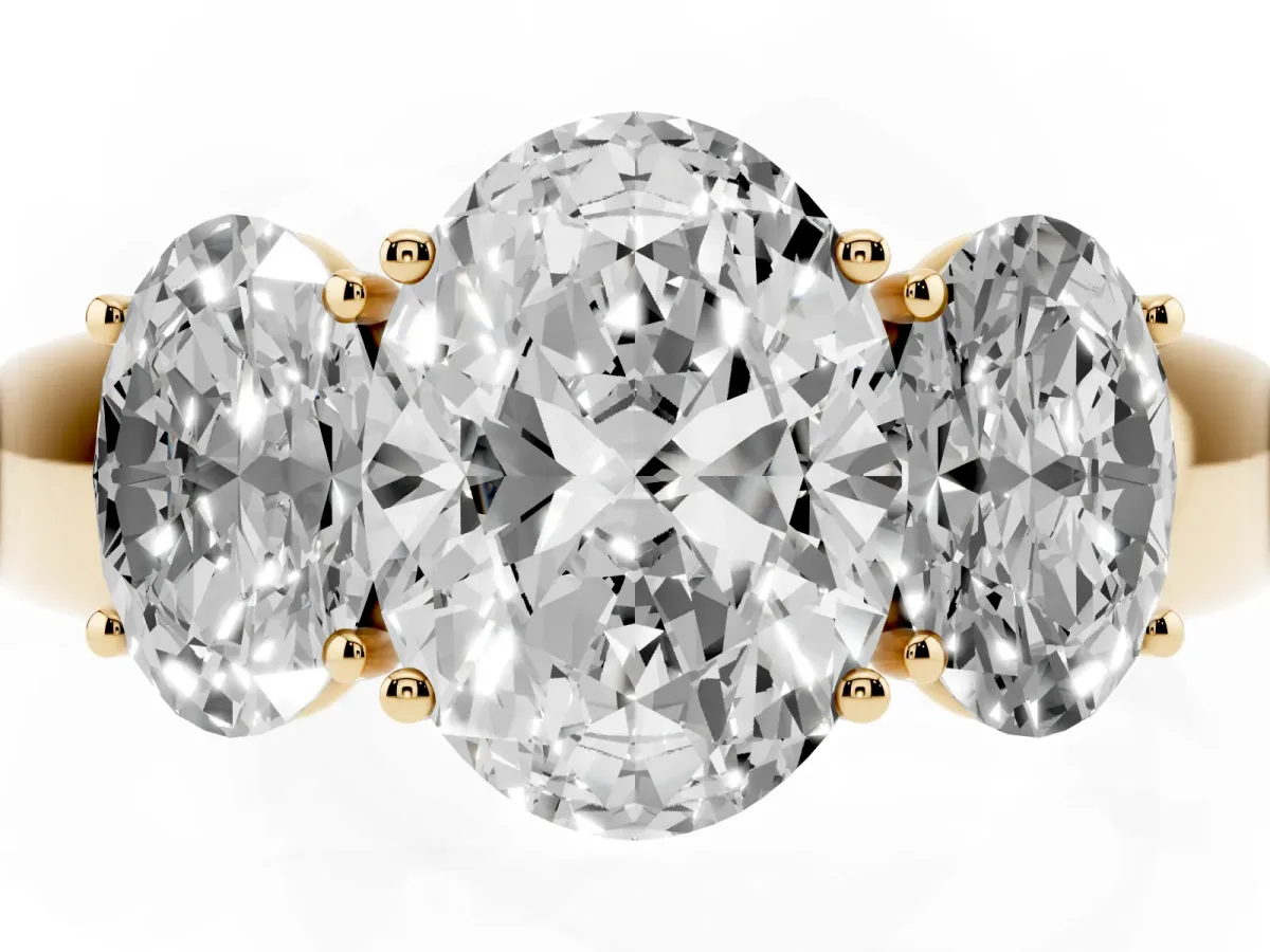 Three-Stone Oval Cut Cut Diamond Ring with Prong Setting and Classic Band Yellow gold