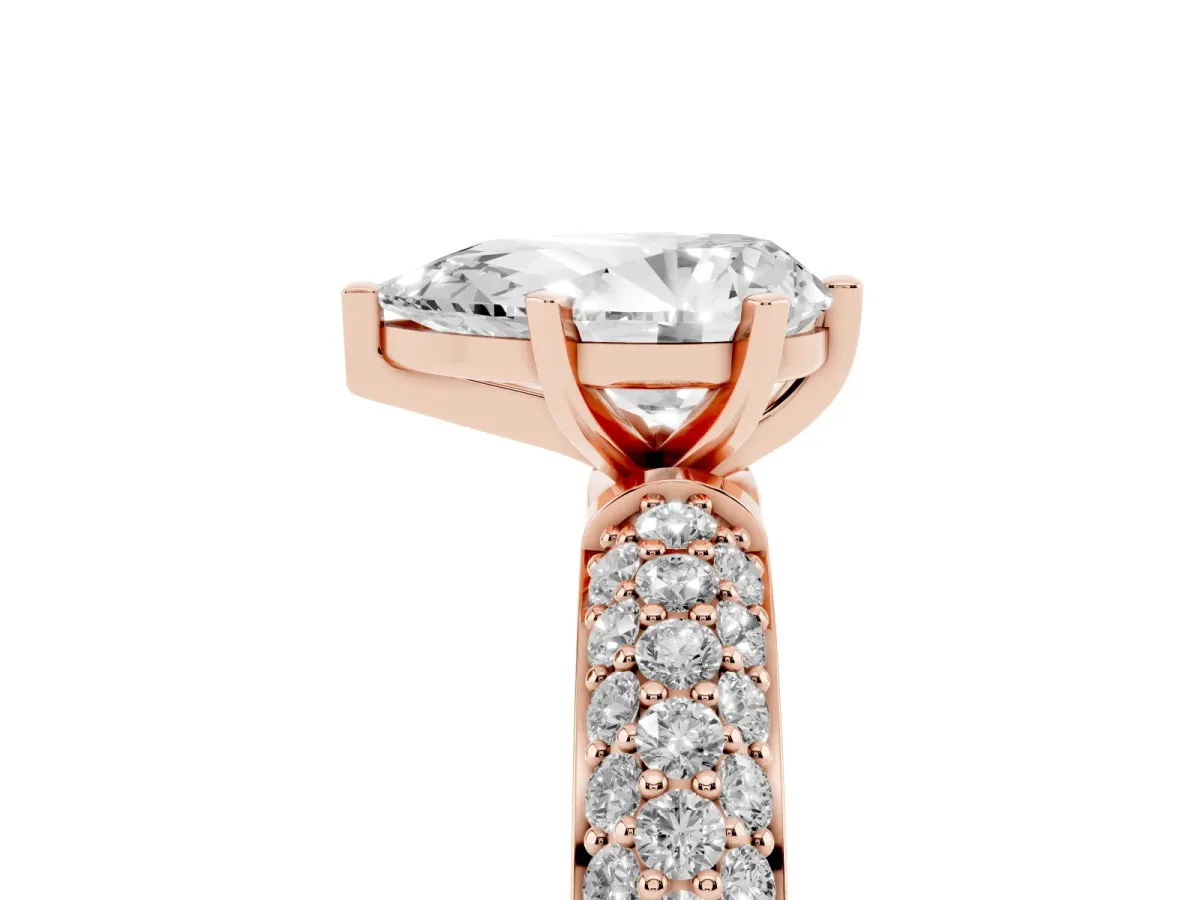 Pear Cut Diamond Solitaire Ring with Prong Setting and Pavé Band Rose gold