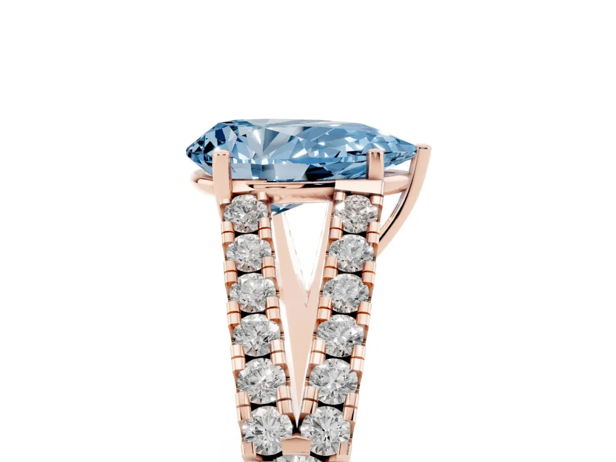 Fancy Blue Pear Cut Diamond Split Shank Engagement Ring with Round Pavé and Prong Setting Rose gold