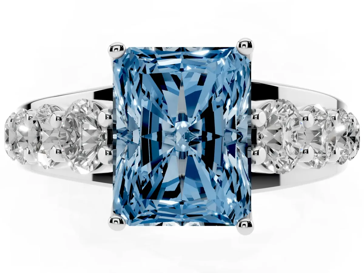 Fancy Blue Radiant Cut Diamond Engagement Ring with Pavé Band and Four-Prong Setting Silver
