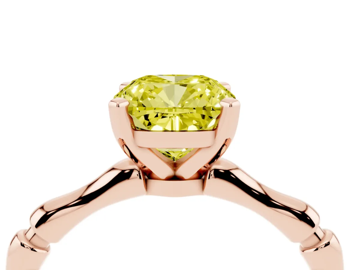 Fancy Yellow Cushion Cut Solitaire Diamond Ring with Bamboo Band and Four-Prong Setting Rose gold