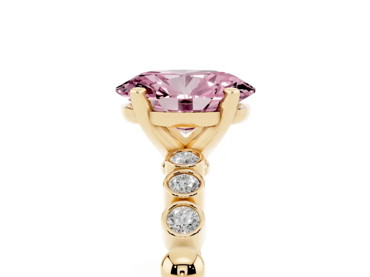 Fancy Pink Oval Cut Solitaire Bezel Accent Diamond Engagement Ring with Beaded Band and Four-Prong Setting Yellow gold
