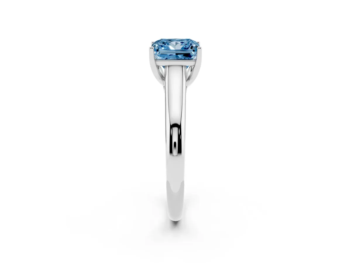 Fancy Blue Princess Cut Solitaire Engagement Ring with Tapered Band and Four-Prong Setting Silver
