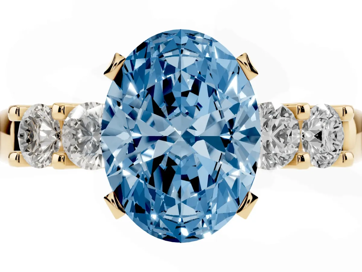 Fancy Blue Oval Cut Brilliant Cut Diamond Five-Stone Prong Set Engagement Ring with Channel Band Yellow gold