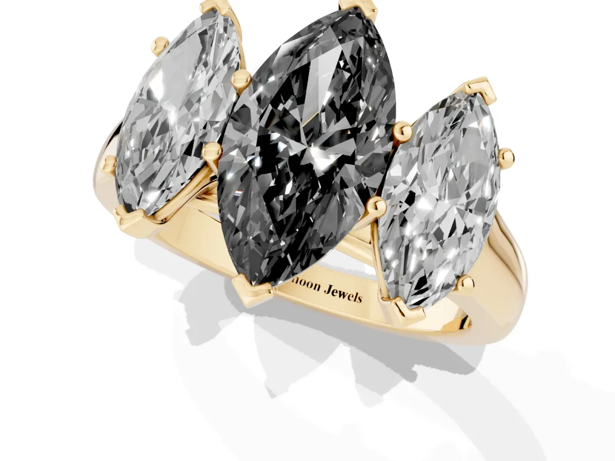 Fancy Black Marquise Cut Three-Stone Diamond Ring with Prong Setting on a Classic Band Yellow gold