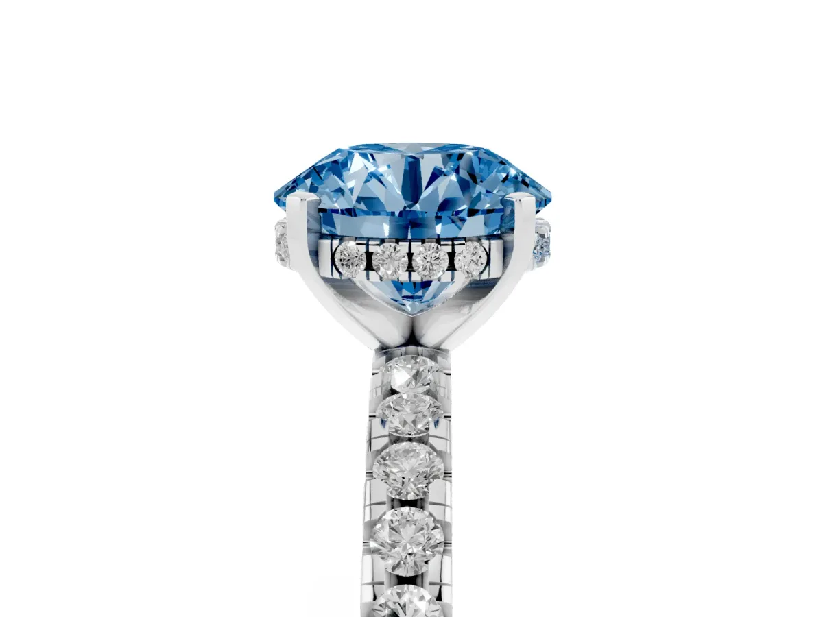 Fancy Blue Round Cut Diamond Solitaire Ring with Round Pavé Band and Four-Prong Setting Silver