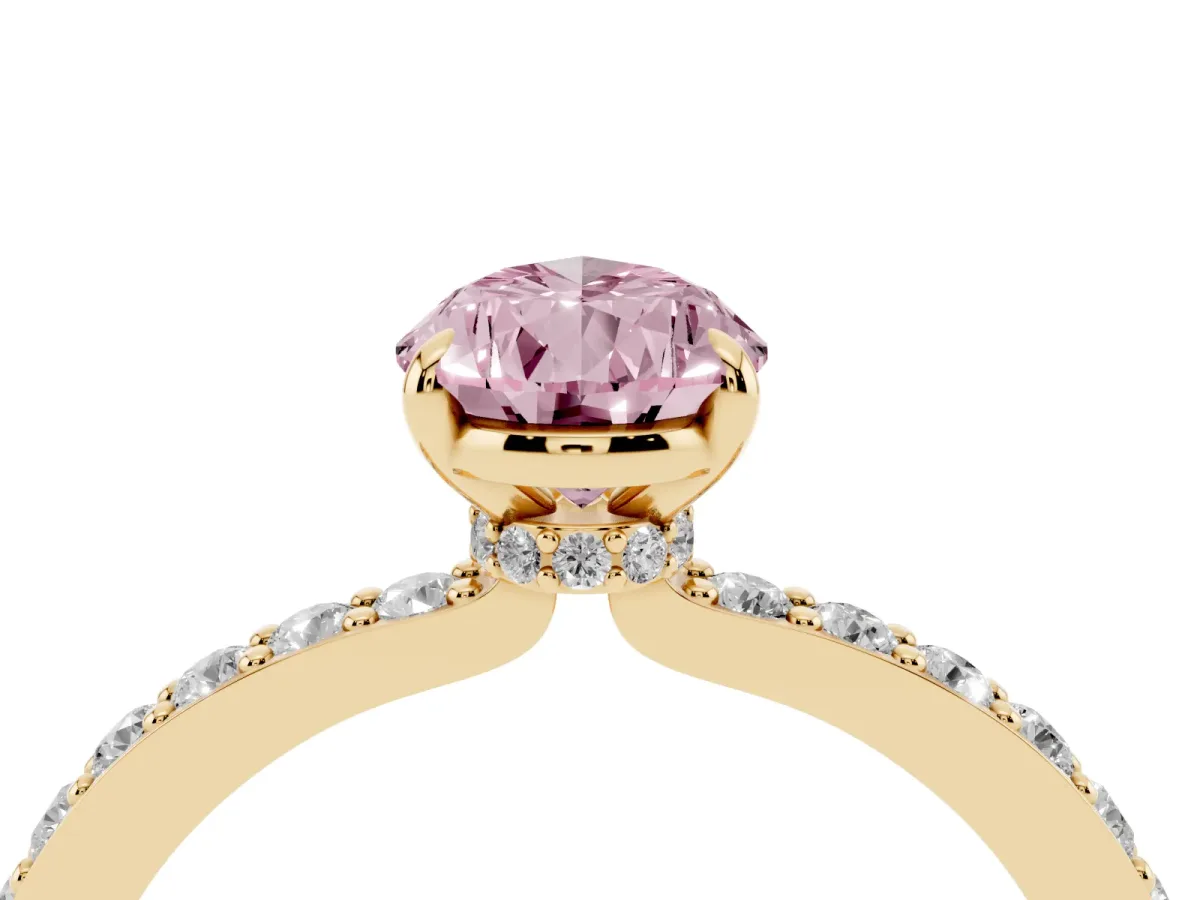 Fancy Pink Pear Cut Diamond Pavé Engagement Ring with Round Accents and Prong Setting Yellow gold
