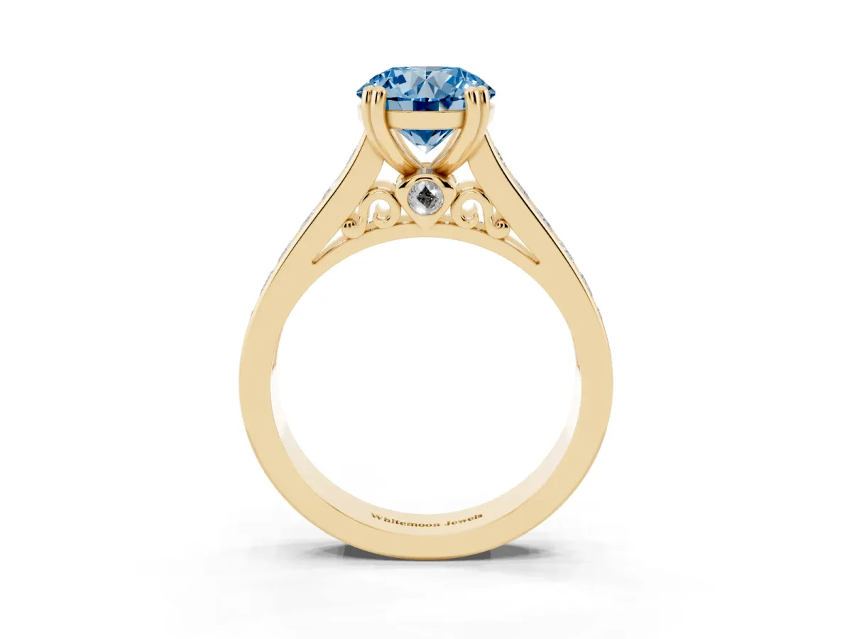 Fancy Blue Round Cut Cut Channel Set Solitaire Engagement Ring with Prong Setting Yellow gold
