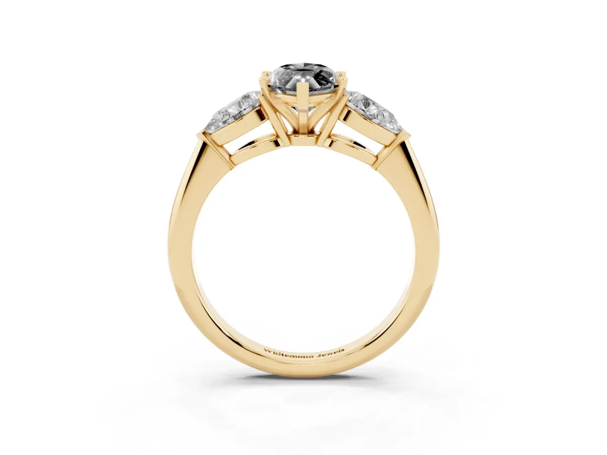 Fancy Black Three-Stone Marquise Cut Diamond Ring with Pear Side Stones and Four-Prong Setting Yellow gold