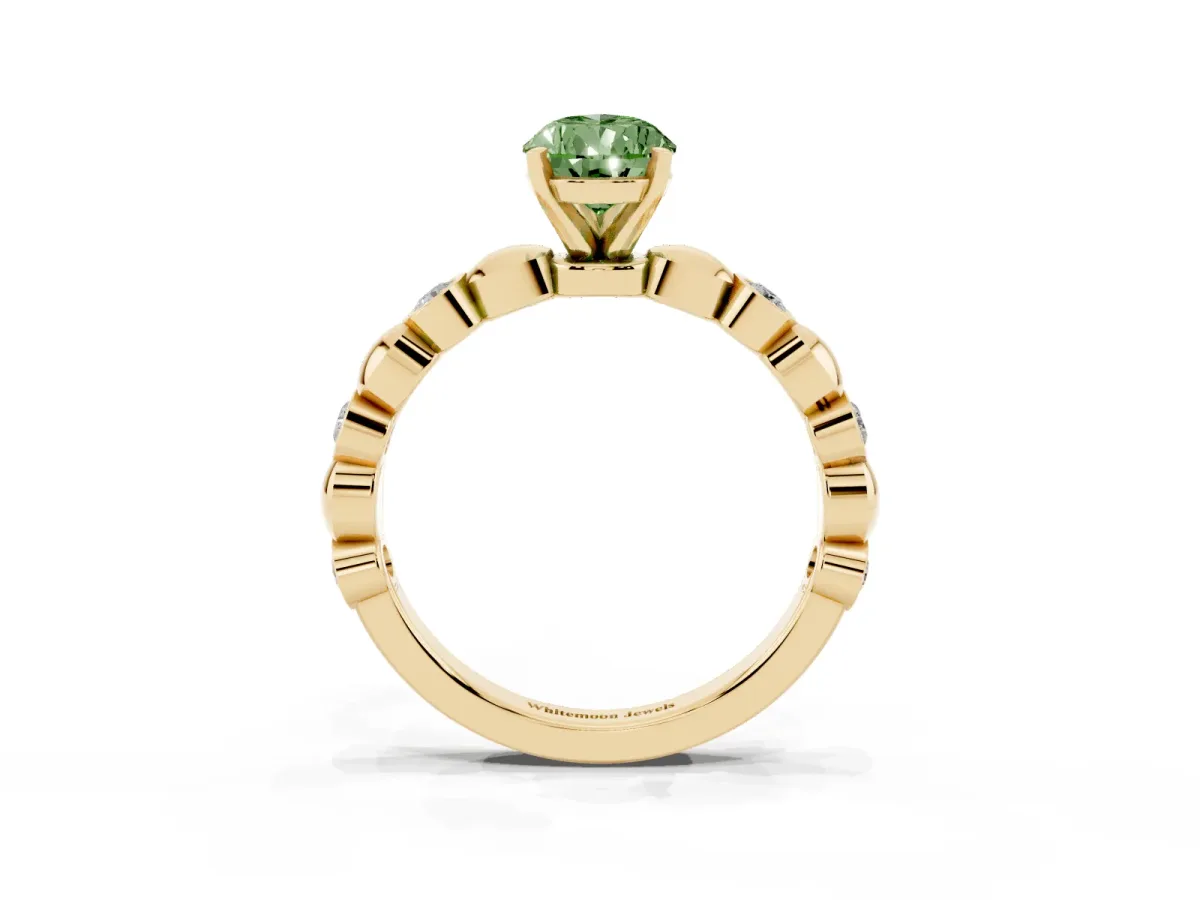 Fancy Green Pear Cut Solitaire Bezel-Set Diamond Ring with Beaded Band and Four-Prong Setting Yellow gold