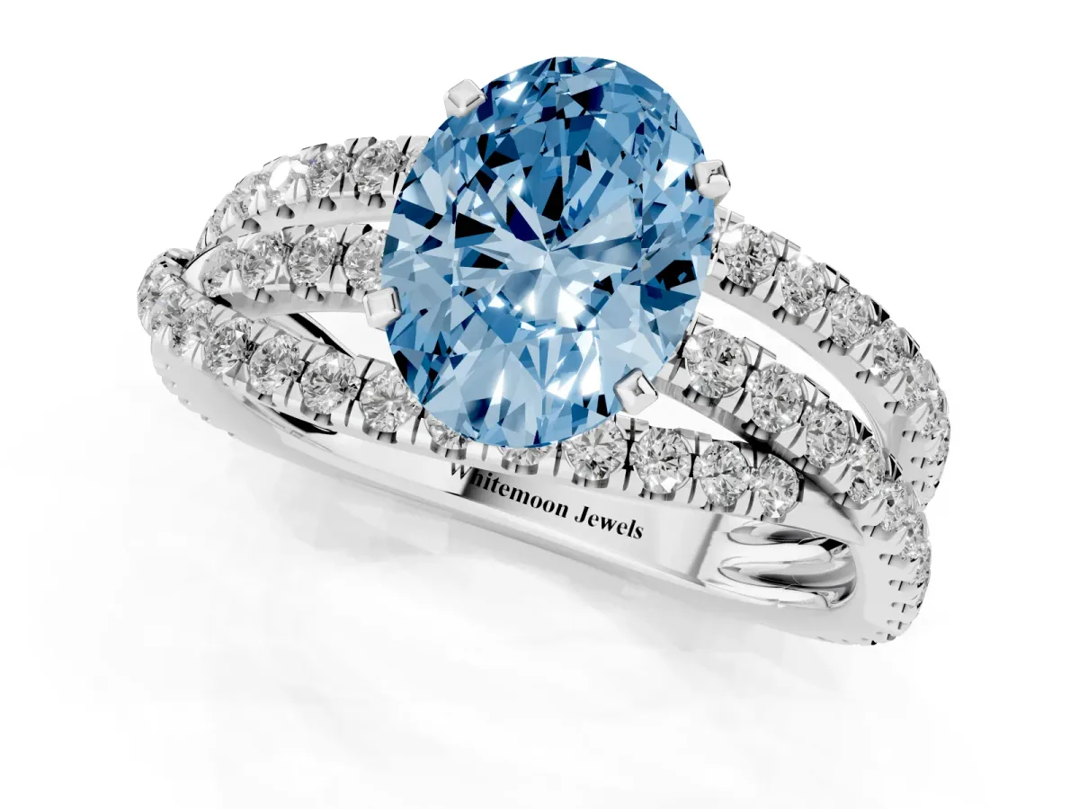 Fancy Blue Oval Cut Solitaire Twist Band with Pavé Setting and Four-Prong Setting Platinum