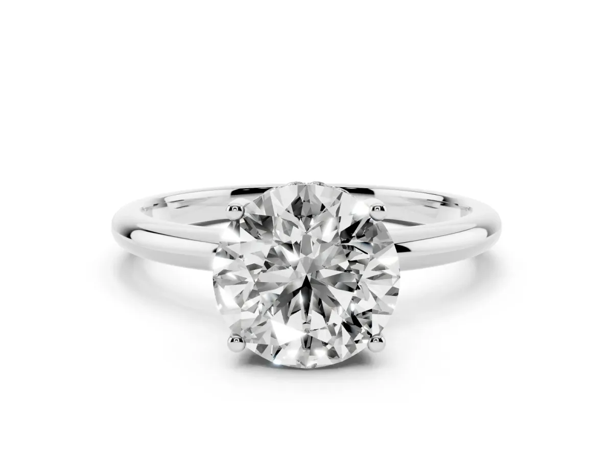Round Cut Cut Solitaire Engagement Ring with Four-Prong Setting and Classic Band White gold