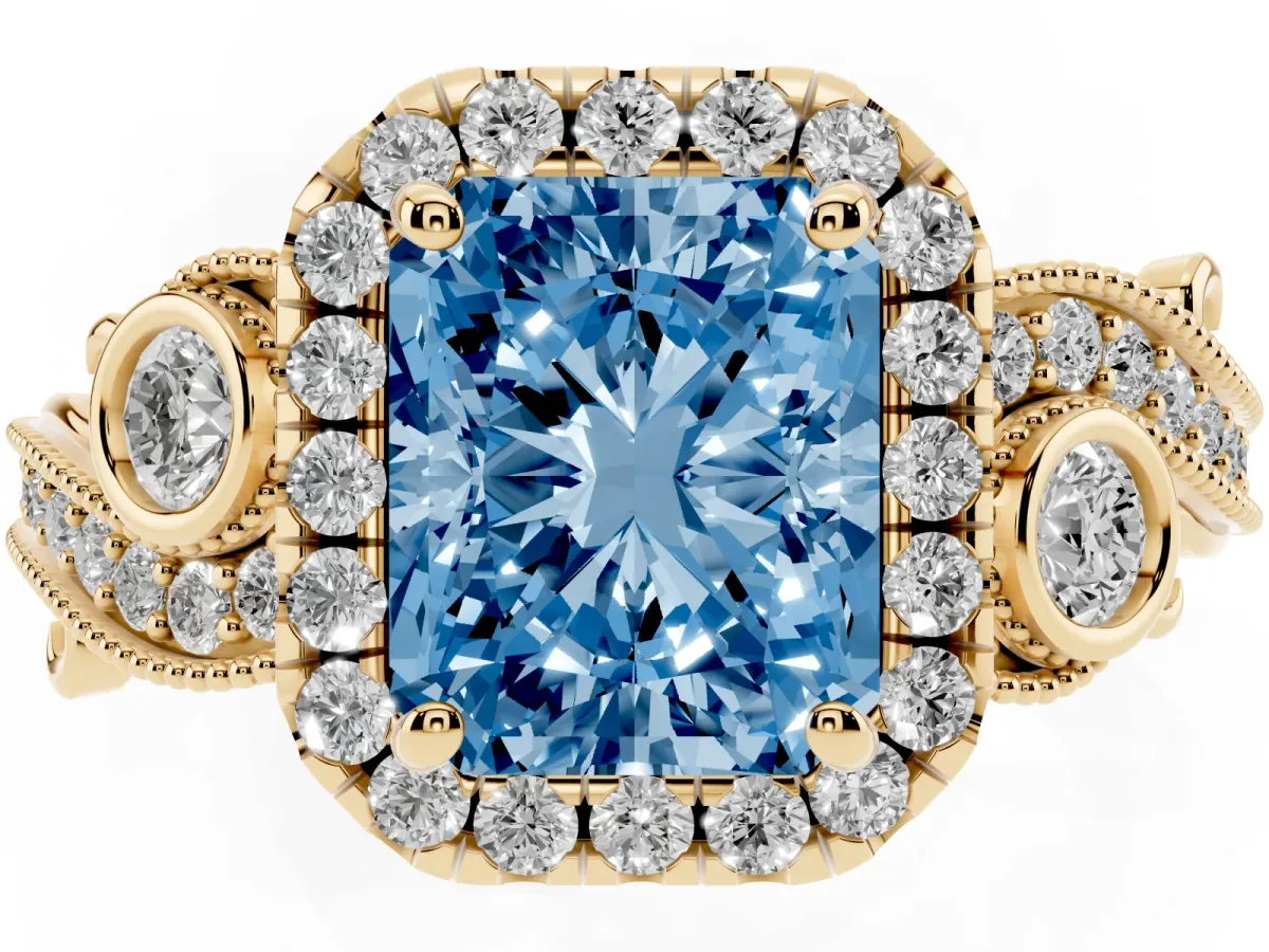 Fancy Blue Radiant Cut Diamond Halo Ring with Milgrain Pavé Band and Four-Prong Setting Yellow gold