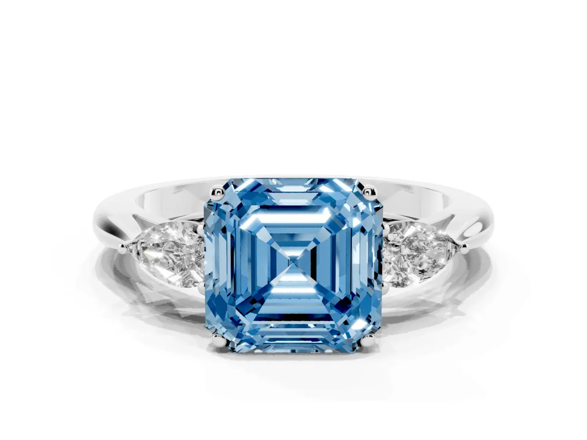 Fancy Blue Three-Stone Asscher Cut Brilliant Diamond Solitaire Ring with Tapered Band and Four-Prong Setting Platinum