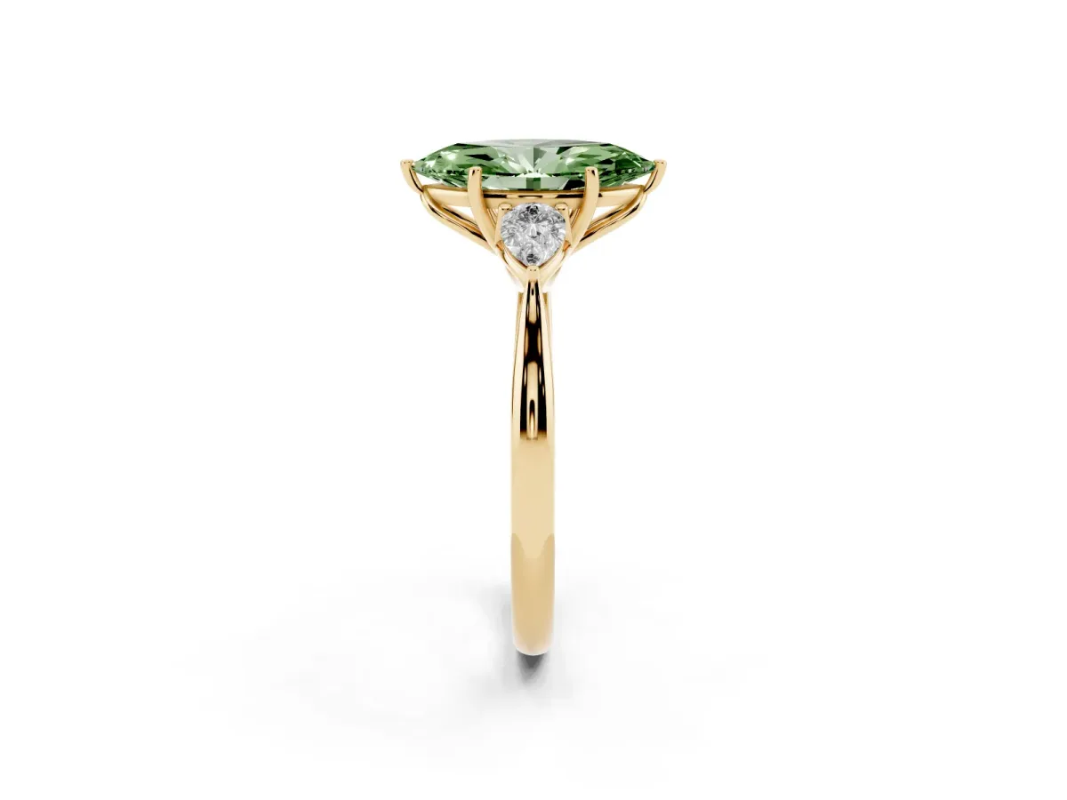 Fancy Green Three-Stone Marquise Cut Brilliant Diamond Solitaire Ring with Tapered Band and Four-Prong Setting Yellow gold