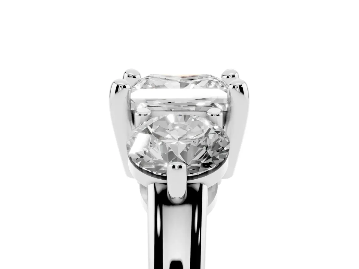 Three-Stone Princess Cut Brilliant Cut Solitaire Ring with Prong Setting on a Classic Band Platinum