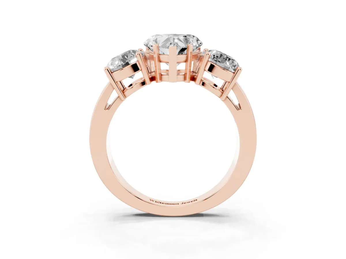 Three-Stone Heart Cut Diamond Ring with Round Side Stones, Classic Band, and Four-Prong Setting Rose gold