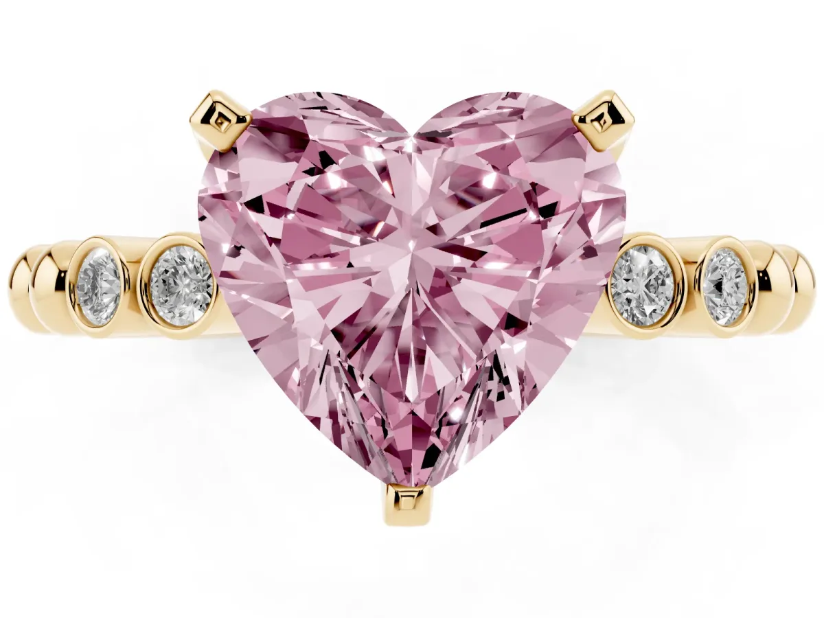 Fancy Pink Heart Cut Solitaire Bezel Accent Diamond Engagement Ring with Beaded Band and Four-Prong Setting Yellow gold