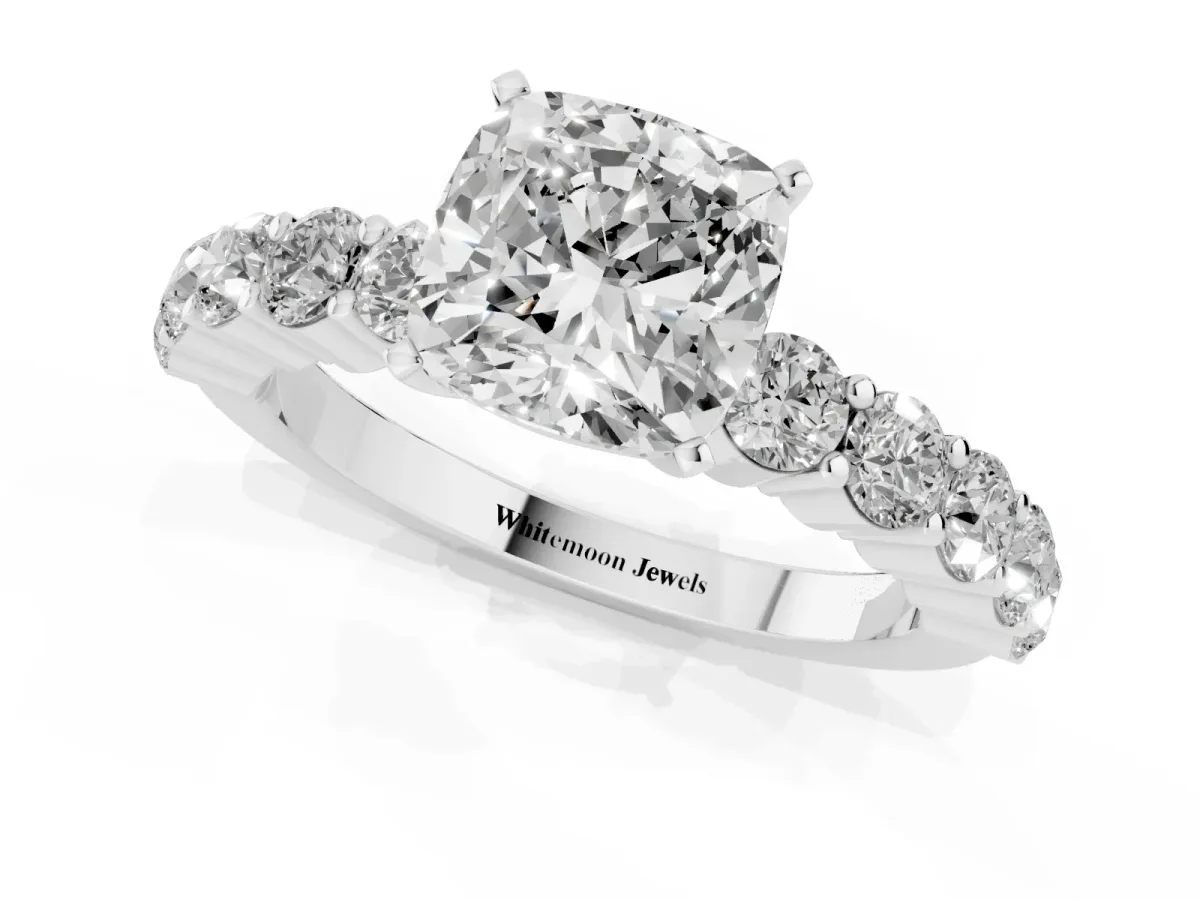 Cushion Cut Diamond Solitaire Ring with Shared Prong Round Side Stones Platinum