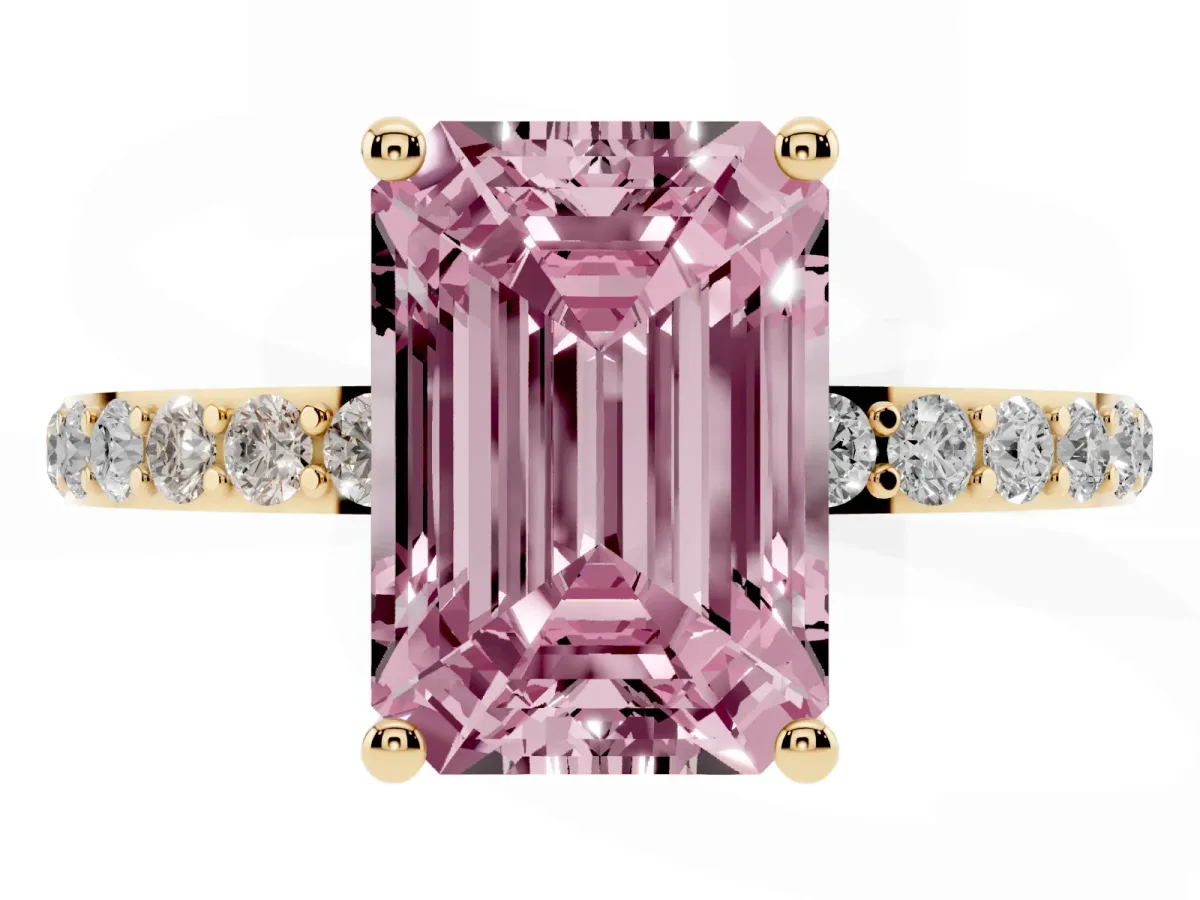 Fancy Pink Emerald Cut Diamond Solitaire Ring with Round Pavé Shoulders and Prong Setting Yellow gold
