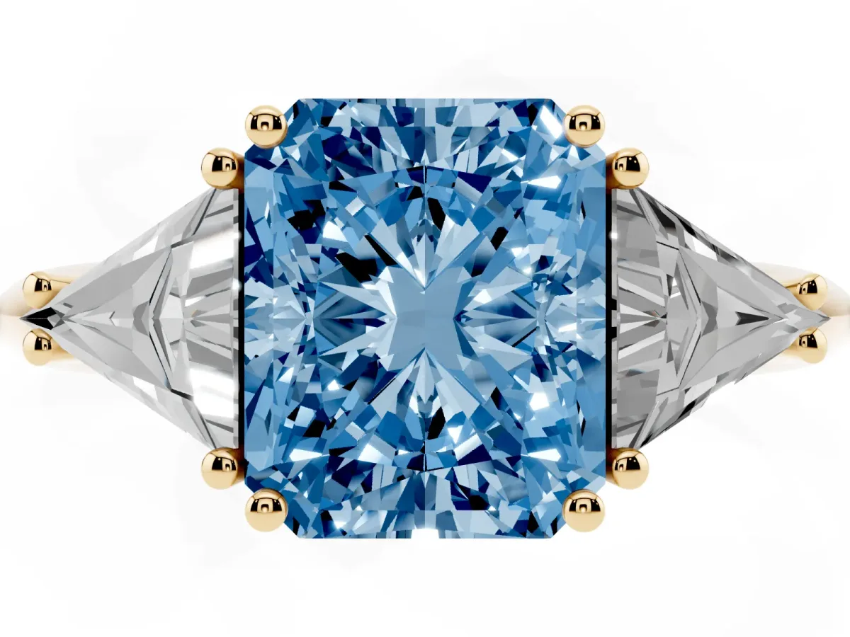 Fancy Blue Three-Stone Radiant Cut Diamond Engagement Ring with Trillion Side Stones and Prong Setting Yellow gold