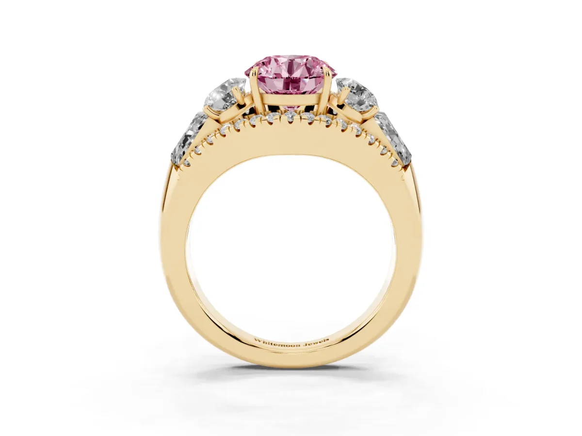 Fancy Pink Three-Stone Round Cut Diamond Engagement Ring with Pave Band and Prong Setting Yellow gold