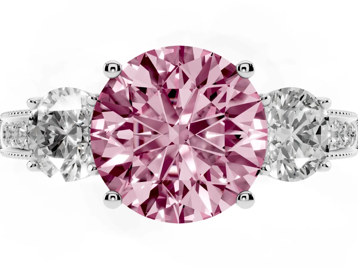 Fancy Pink Round Cut Three-Stone Diamond Ring with Pavé Band and Four-Prong Setting Silver
