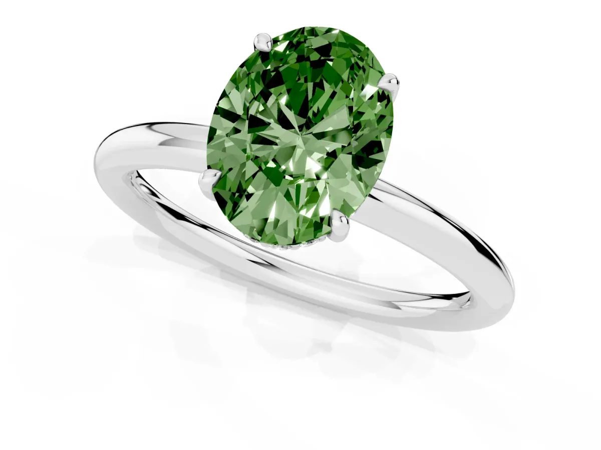 Fancy Green Oval Cut Diamond Solitaire Ring with Thin Band and Four-Prong Setting Silver