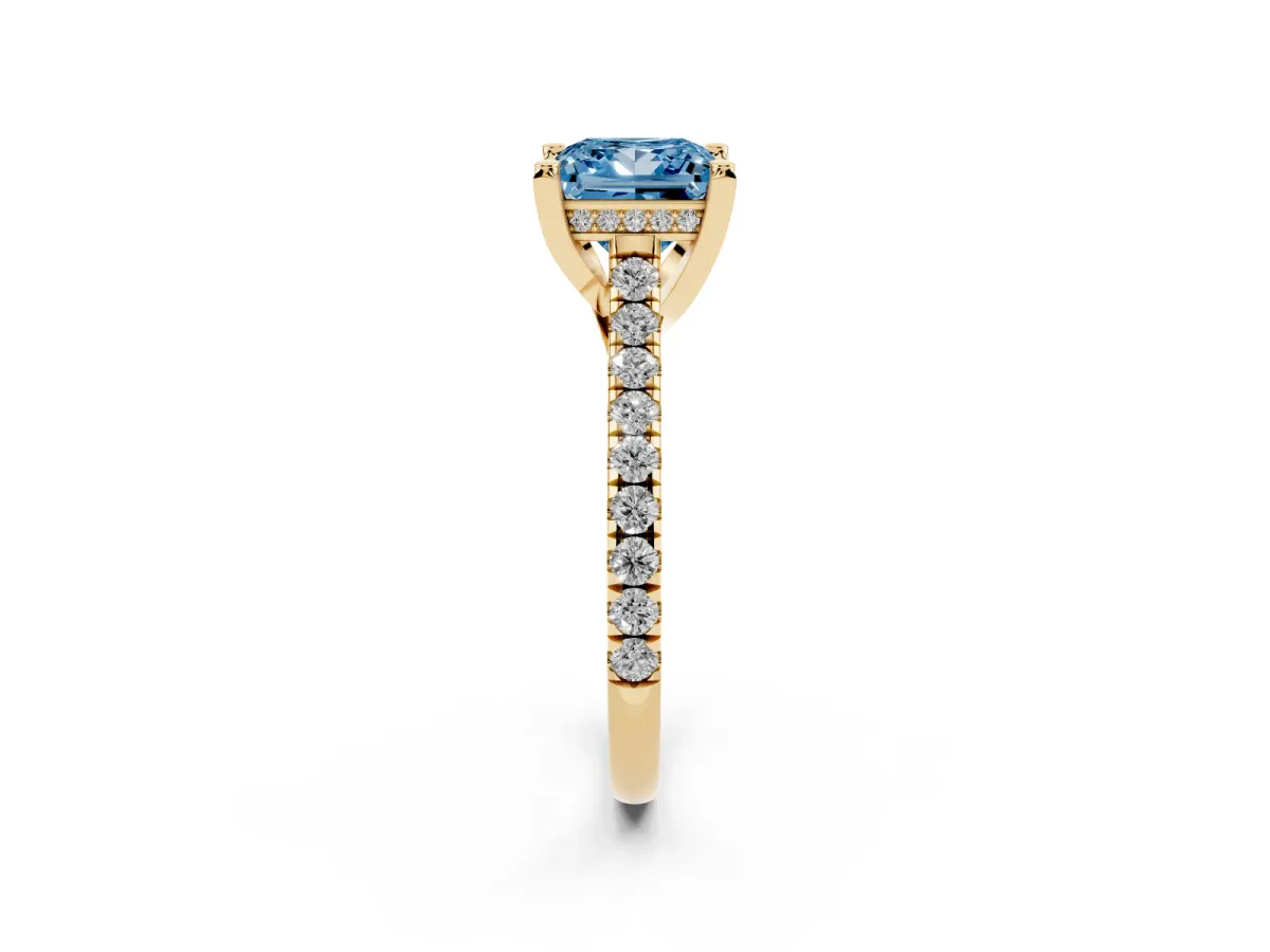 Fancy Blue Princess Cut Brilliant Diamond Solitaire with Pavé Band and Four-Prong Setting Yellow gold