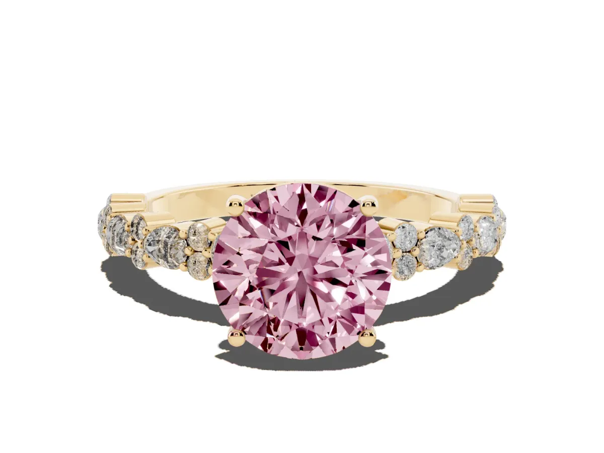 Fancy Pink Round Cut Diamond Side Stone Solitaire Ring with Round and Four-Prong Setting Yellow gold