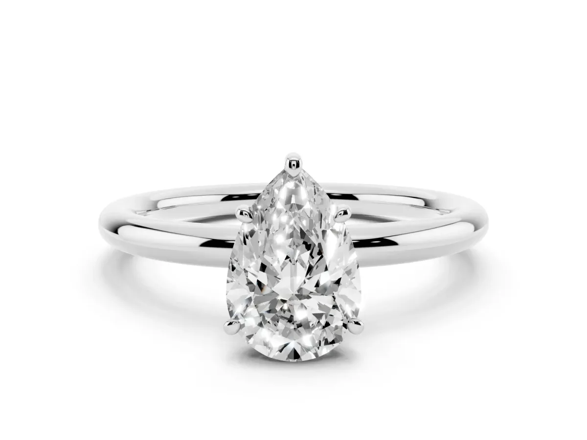 Pear Cut Solitaire Diamond Ring with Four-Prong Setting on a Plain Band Silver