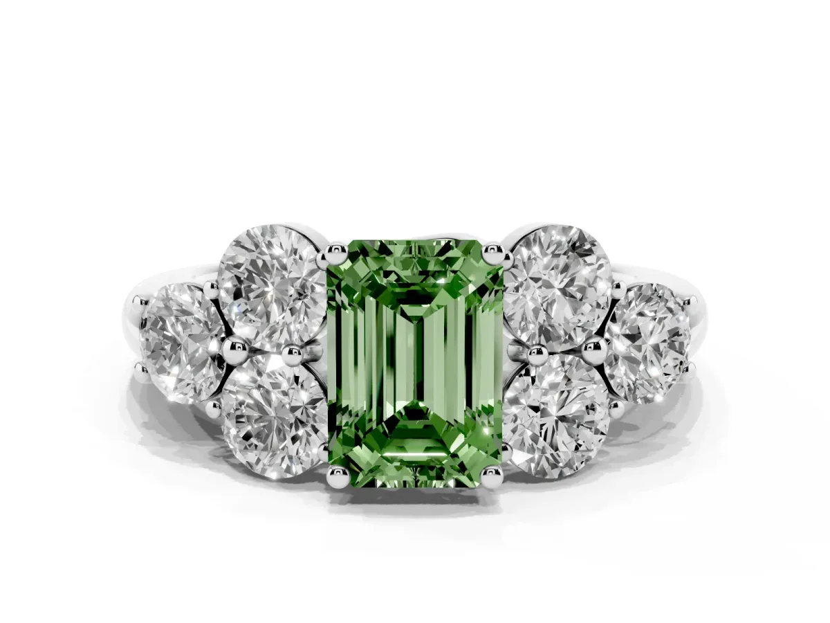 Fancy Green Emerald Cut Cut Diamond Cluster Ring with Round Accent Stones and Prong Setting on a Classic Band White gold