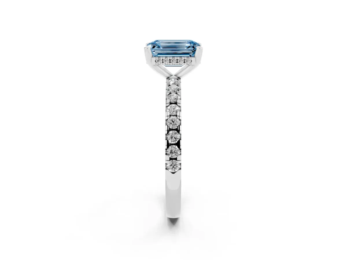 Fancy Blue Emerald Cut Diamond Solitaire Ring with Round Pavé Band and Four-Prong Setting Silver