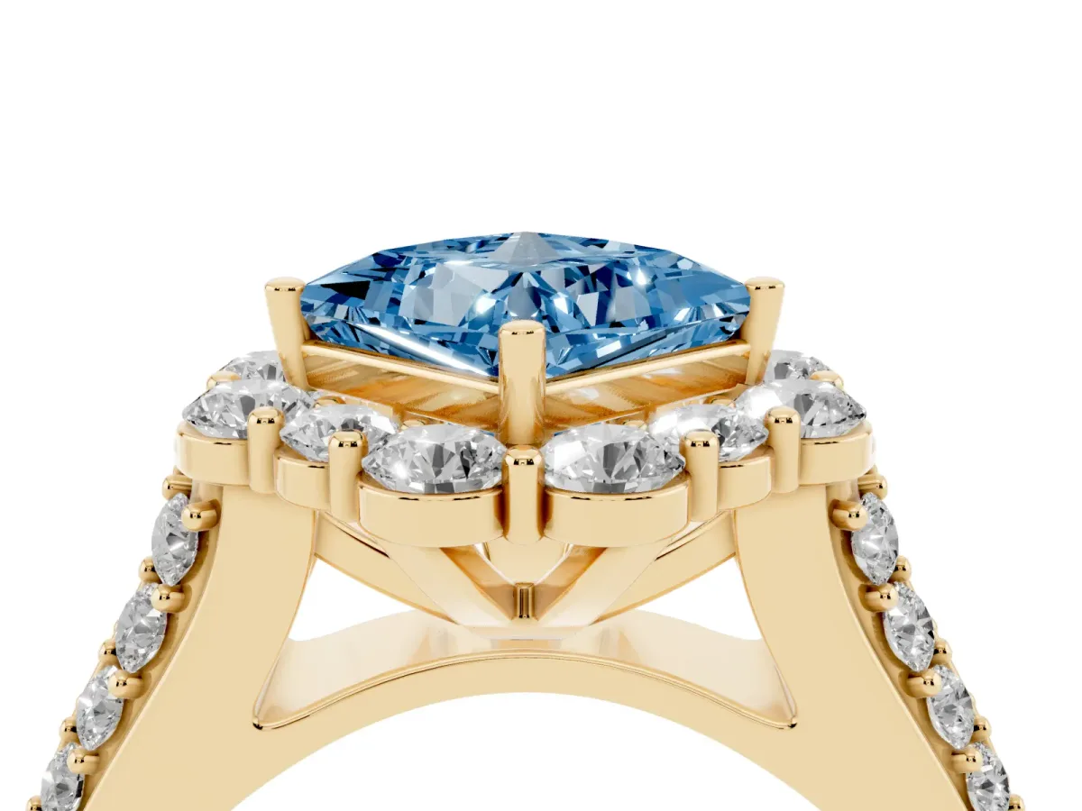Fancy Blue Princess Cut Halo Diamond Engagement Ring with Split Shank and Prong Setting Yellow gold