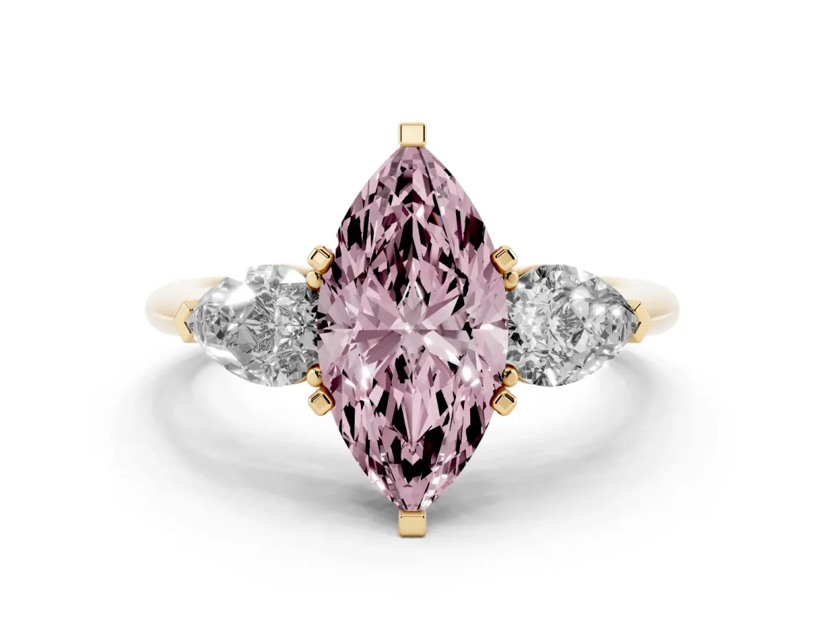 Fancy Pink Three-Stone Marquise Cut Diamond Ring with Pear Side Stones and Four-Prong Setting Yellow gold