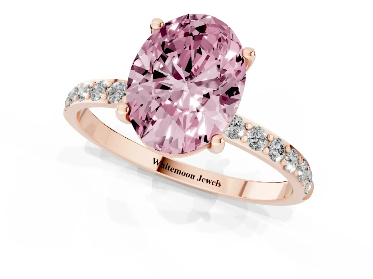 Fancy Pink Oval Cut Diamond Solitaire Ring with Round Pavé Shoulders and Prong Setting Rose gold