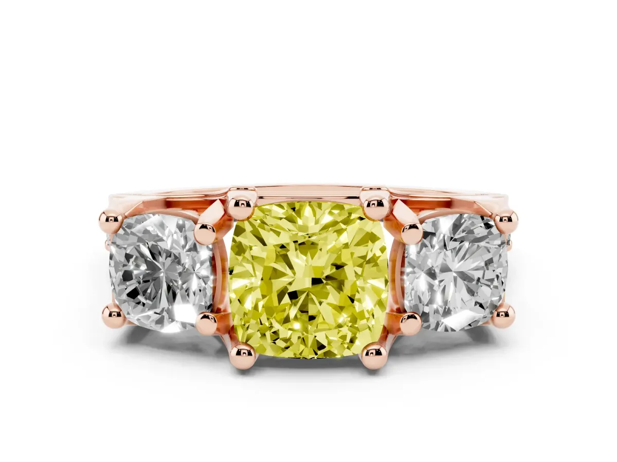 Fancy Yellow Cushion Cut Diamond Three-Stone Ring with Channel Set Band and Four-Prong Setting Rose gold
