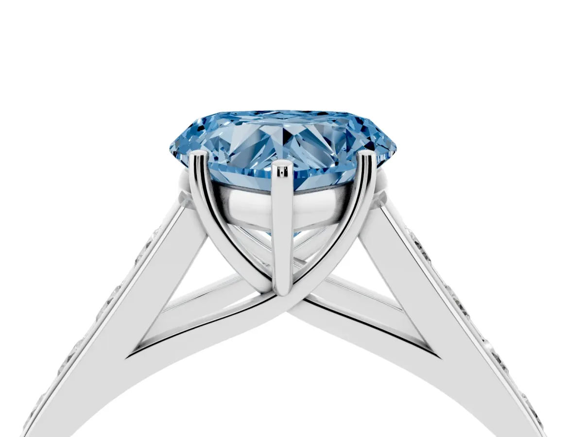 Fancy Blue Heart Cut Brilliant Channel-Set Solitaire Ring with Four-Prong Setting Silver