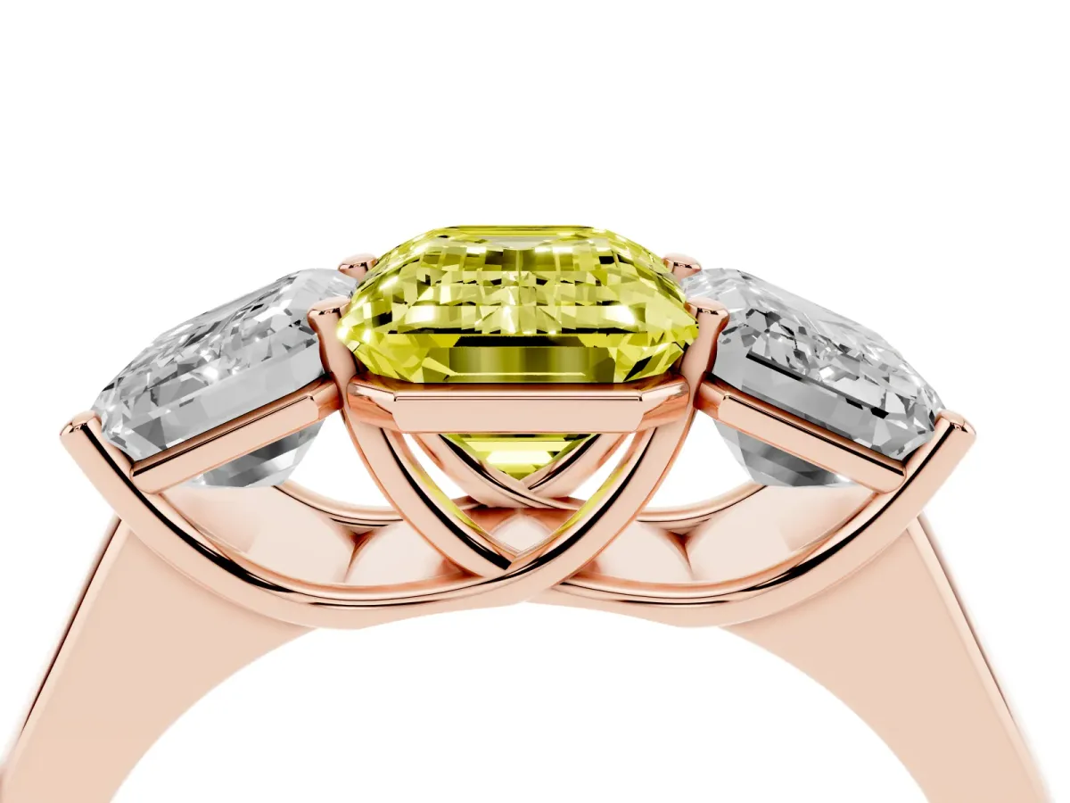Fancy Yellow Emerald Cut Three-Stone Diamond Ring with Prong Setting on a Classic Band Rose gold